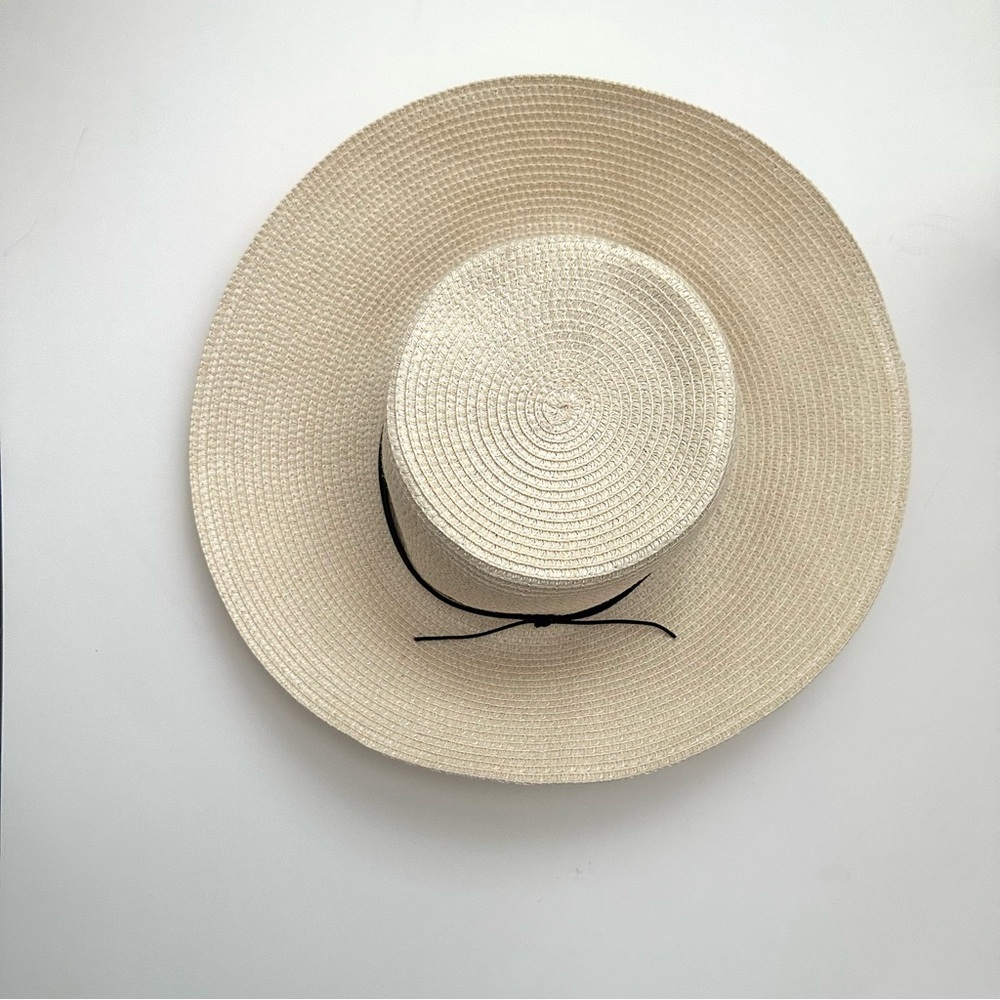 Aritzia Stylish Cream Straw Hat with Black Ribbon
